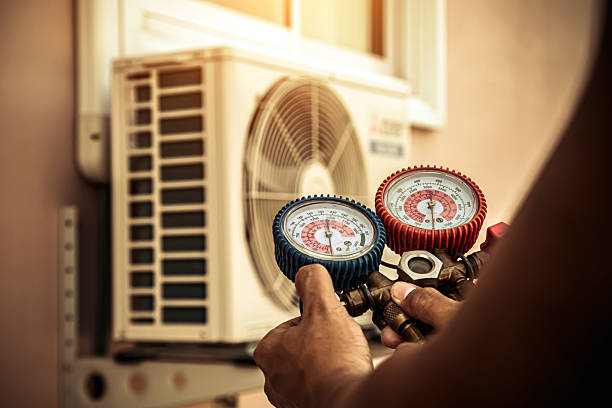 Professional Air Conditioning Service technician working in Mayfield, OH